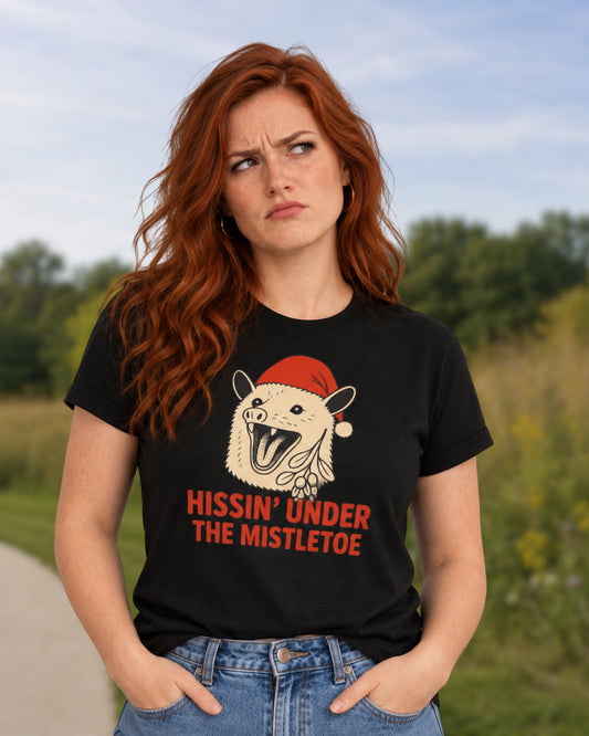 Hissin' under the misletoe T-shirts