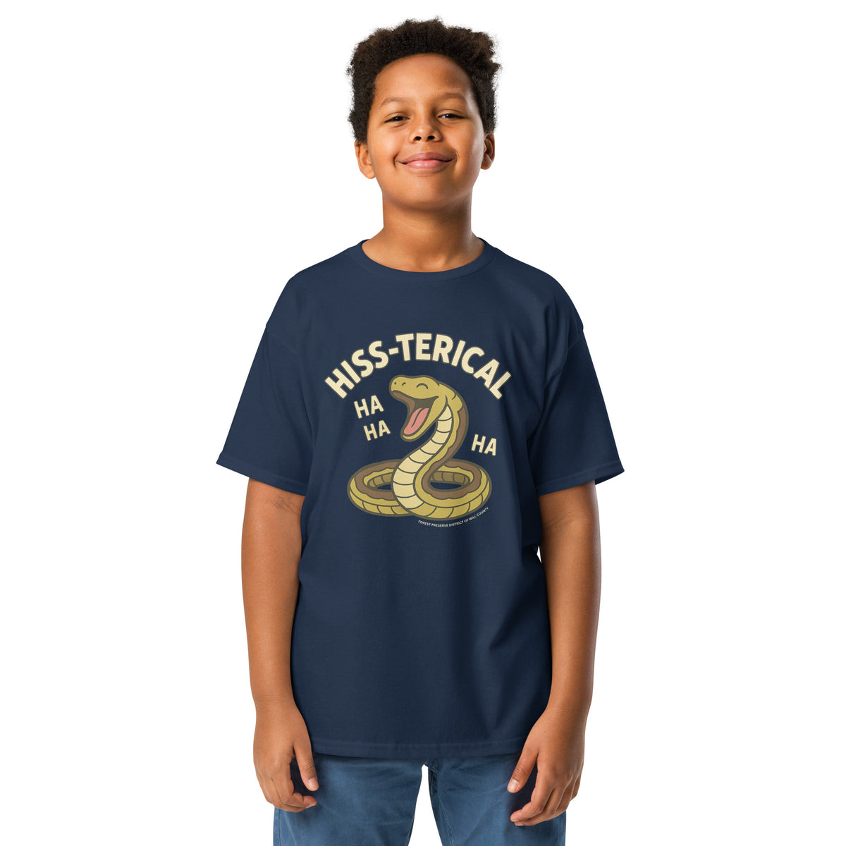 A boy wearing a snake shirt that says hiss-terical